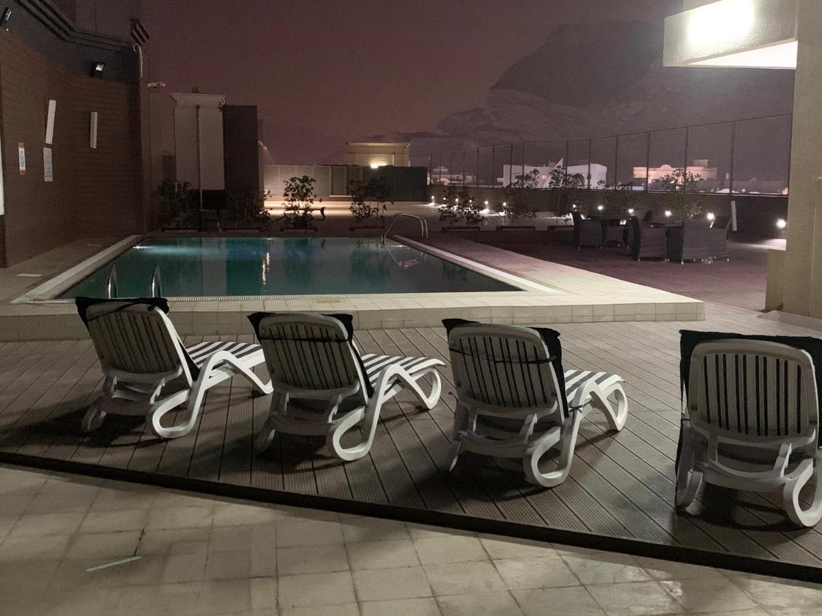 Golden Tulip Headington Hotel Masqat Buitenkant foto