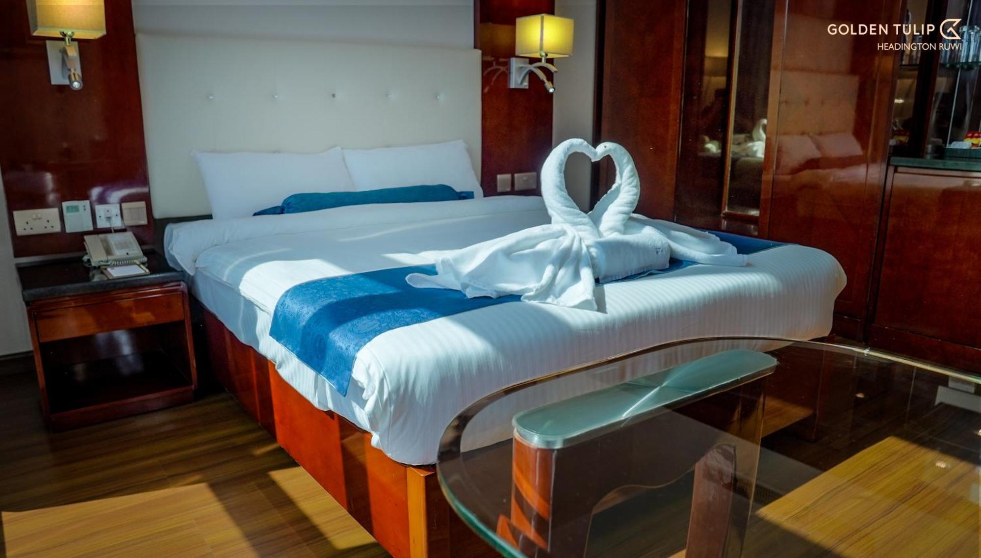 Golden Tulip Headington Hotel Masqat Buitenkant foto