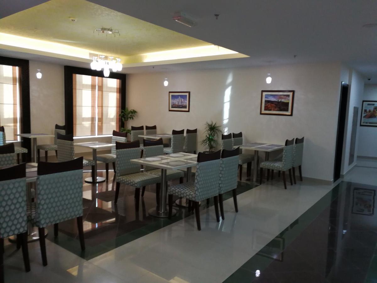 Golden Tulip Headington Hotel Masqat Buitenkant foto