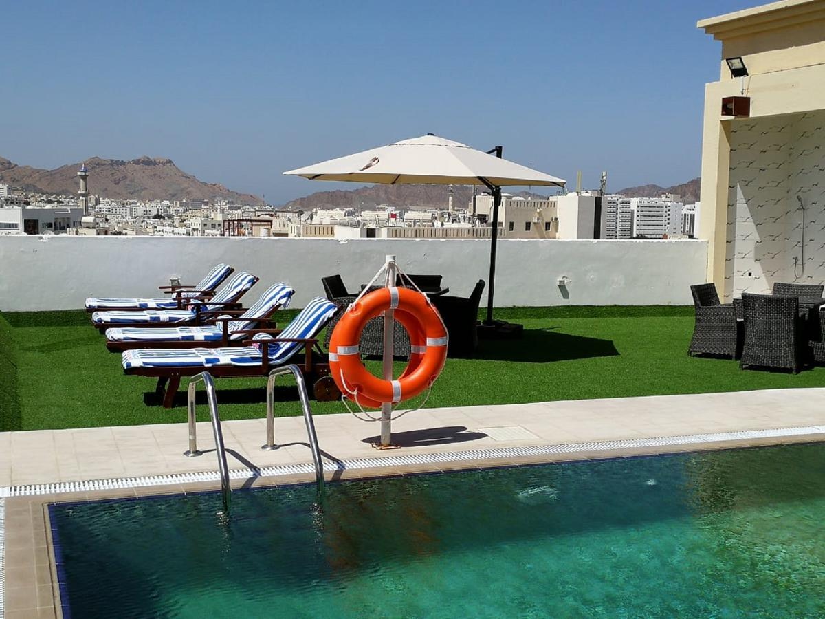 Golden Tulip Headington Hotel Masqat Buitenkant foto